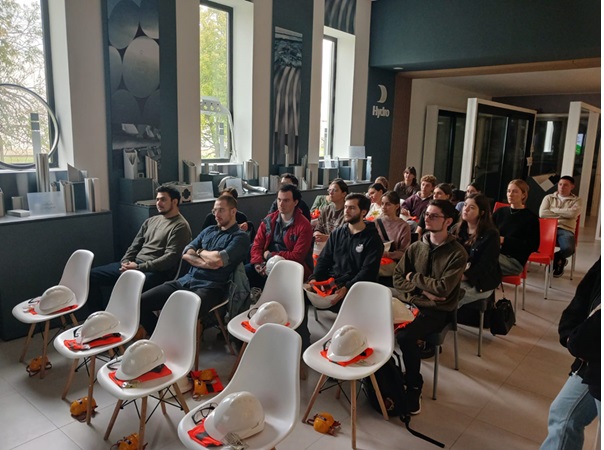 a group of people sitting in chairs