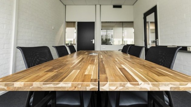 conference room with six chairs around a table conference room with six chairs around a table