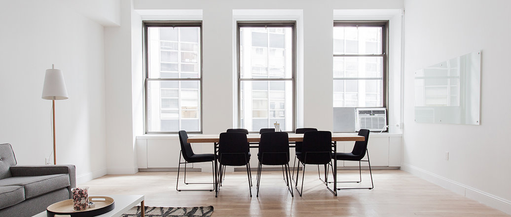 white room with three vertically sliding windows white room with three vertically sliding windows
