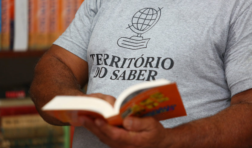 a person holding a book a person holding a book