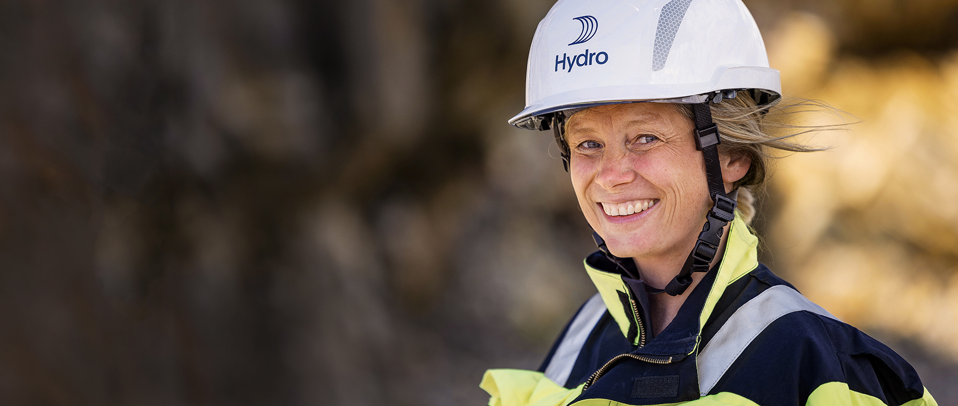 a woman wearing a hard hat