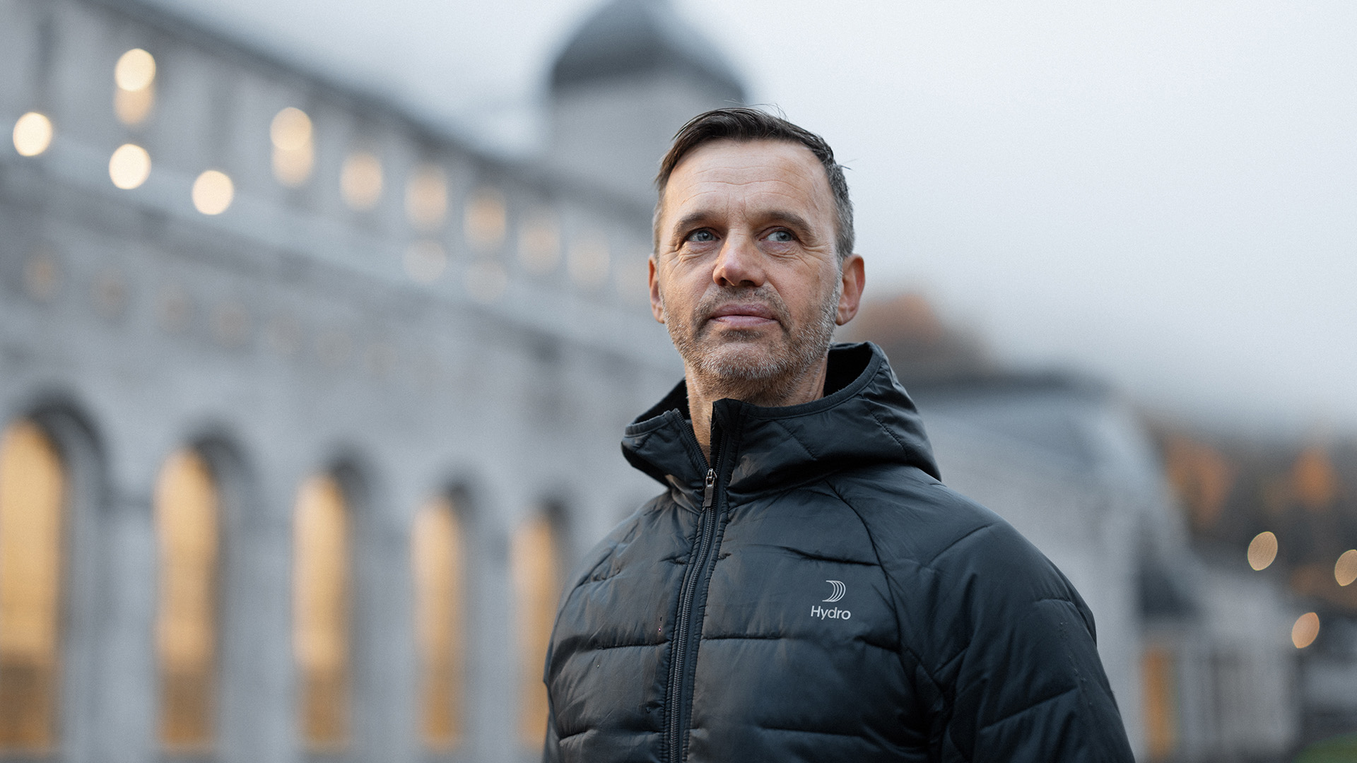 a man in a black jacket