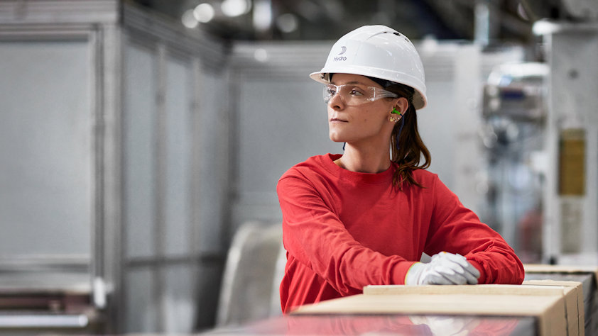 a woman wearing a hard hat