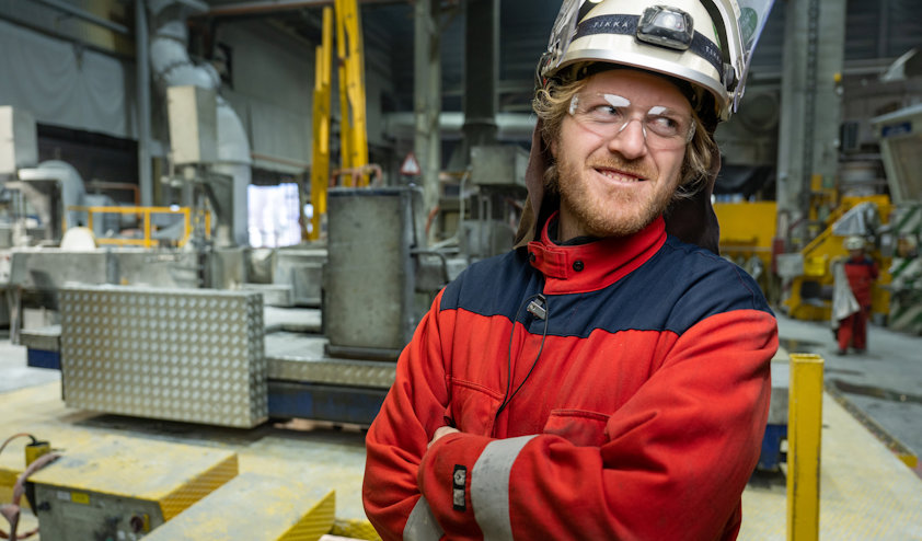 a man wearing a hard hat and protective glasses a man wearing a hard hat and protective glasses