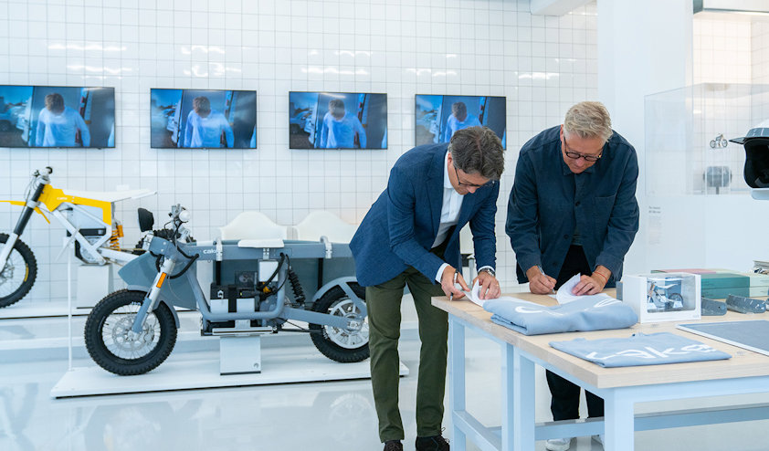 men signing a contract men signing a contract