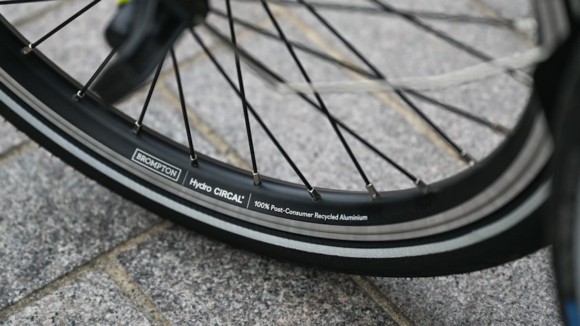 a bicycle tire on a sidewalk a bicycle tire on a sidewalk