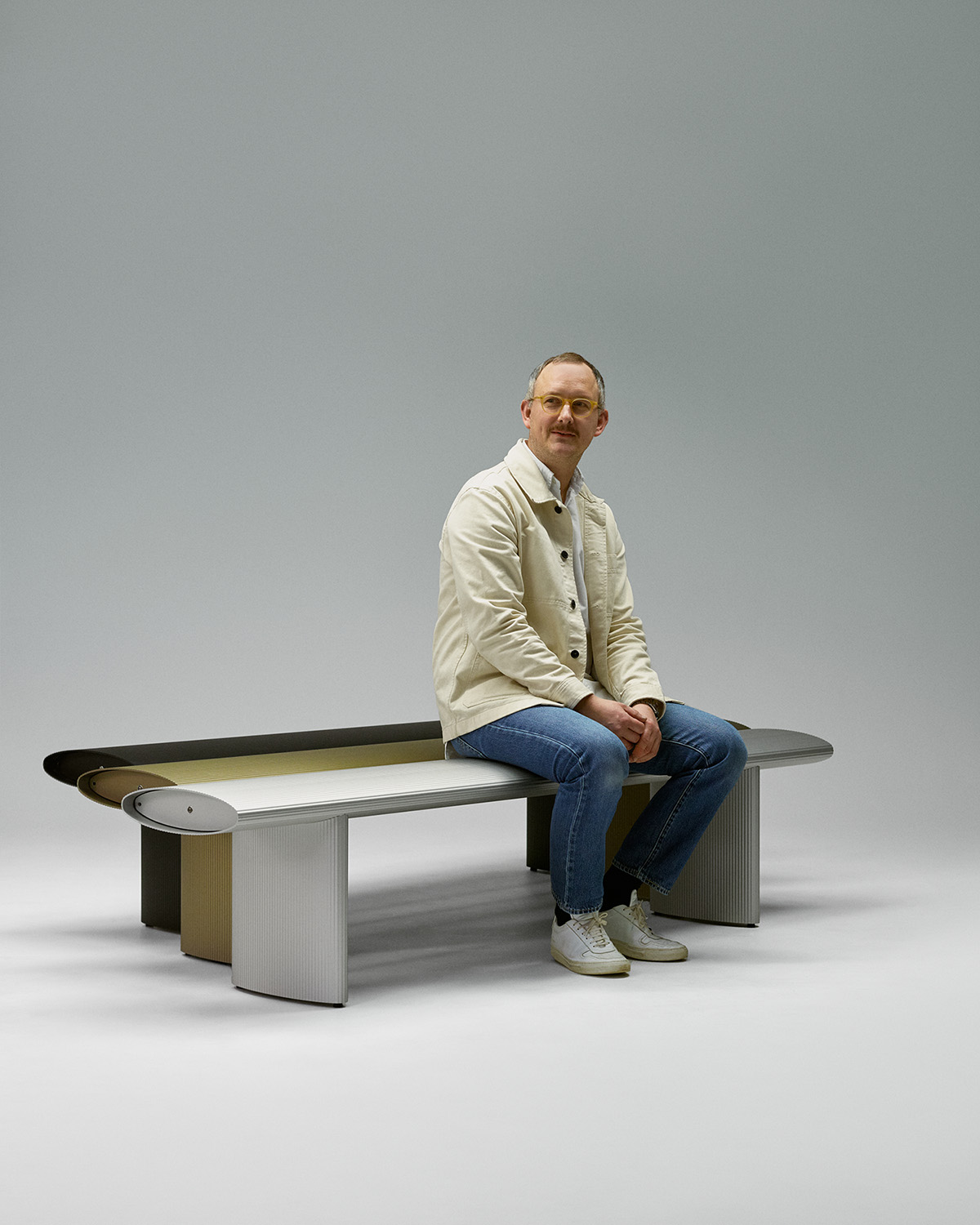 a man sitting on a bench