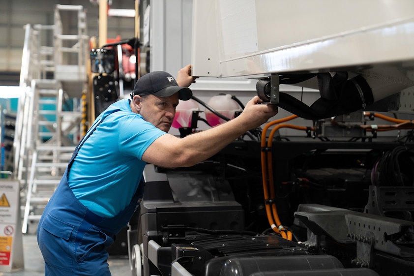 a man working on a truck