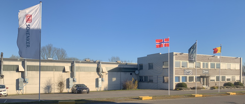 a building with flags in front a building with flags in front
