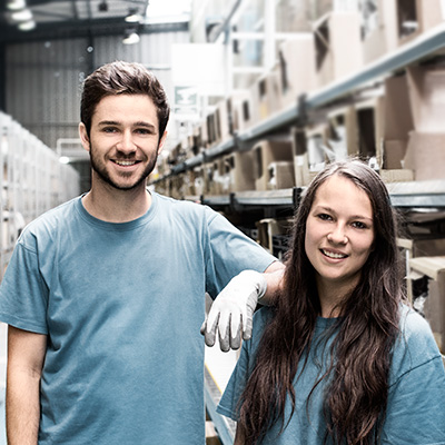 Two Hydro employees in a warehouse