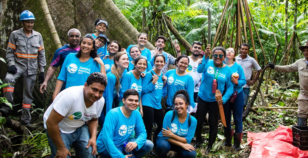 a group of people posing for a photo