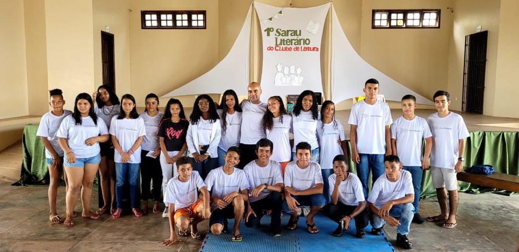 a group of people posing for a photo