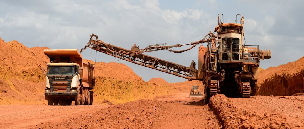 a construction vehicle on a dirt road