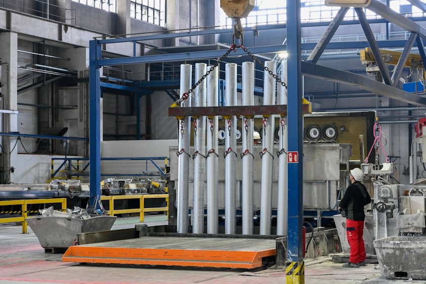 a person standing in a factory a person standing in a factory