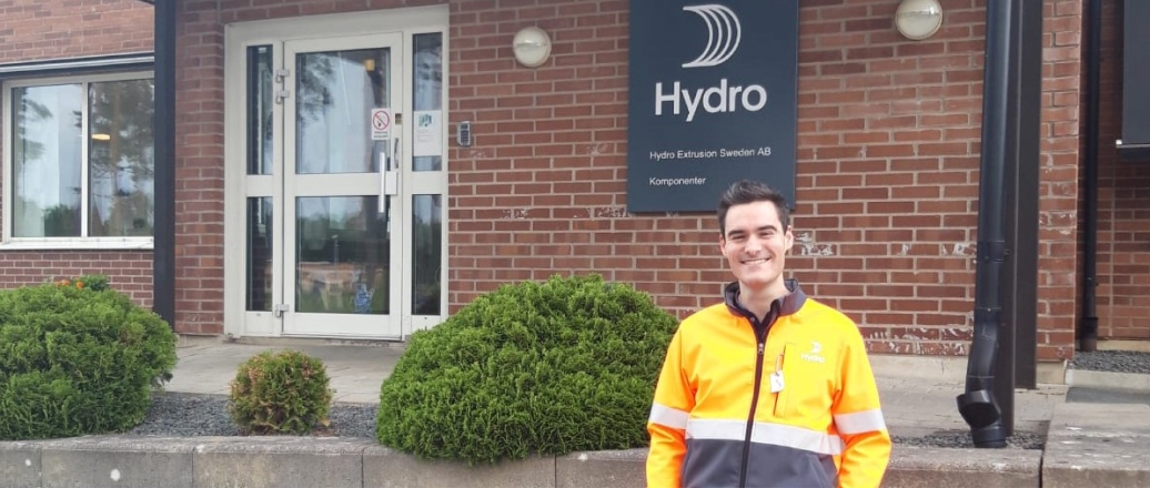 a man standing in front of a building